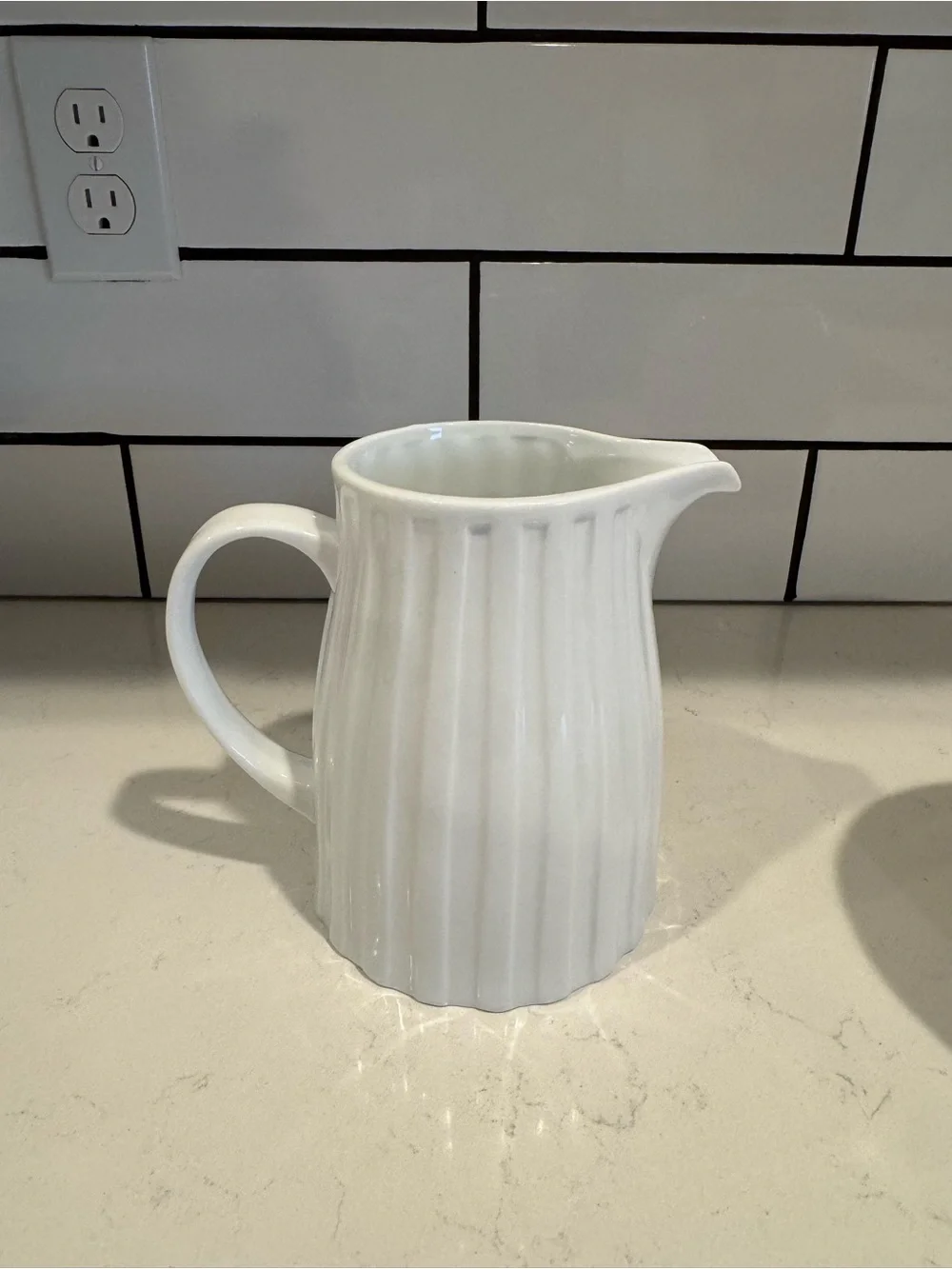 Crate&Barrel White Scalloped Ceramic pitcher